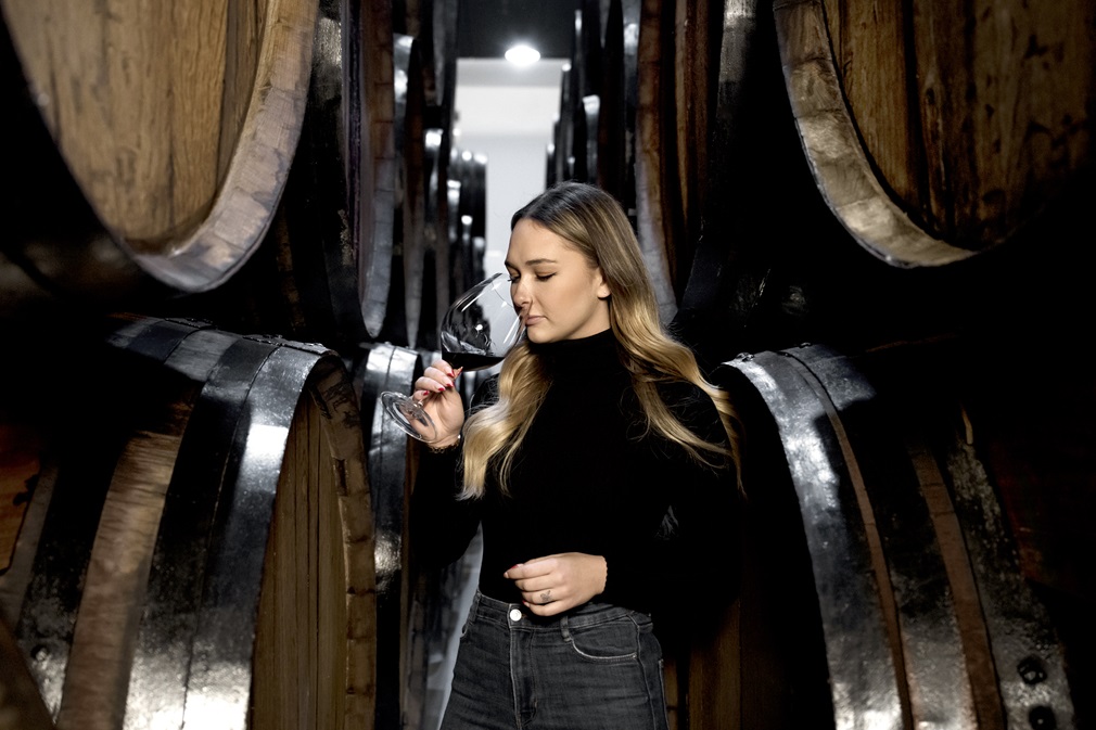 medium-shot-woman-tasting-wine