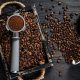 Ground Coffee in Portafilter for Espresso in a wooden tray with