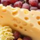 close-up-gourmet-emmental-cheese-with-grapes